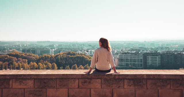 Woman looking at a city