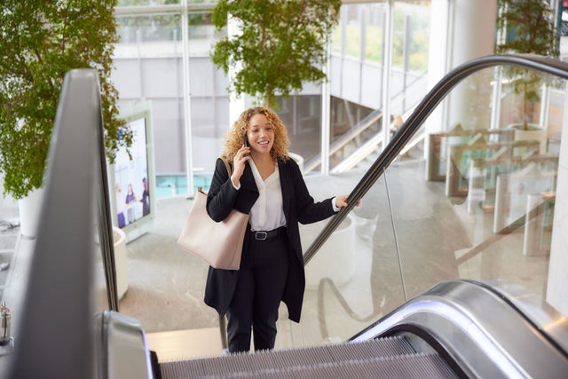 Woman on an escalator