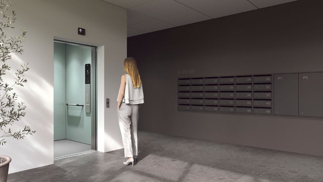 woman outside elevator