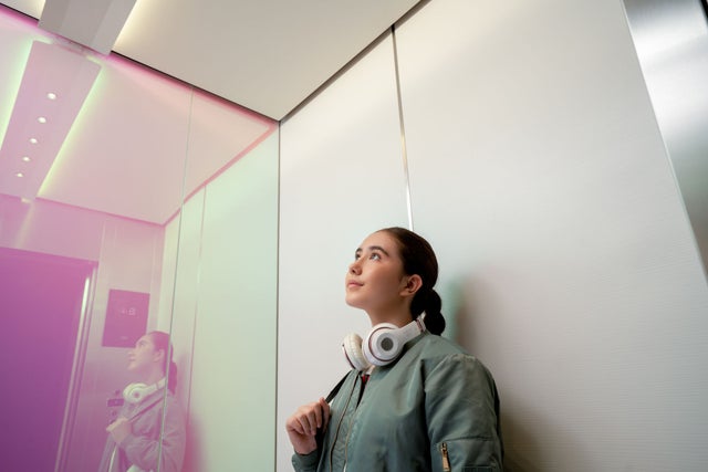 Young woman in an elevator
