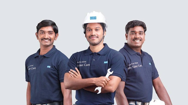 KONE employee with headphones