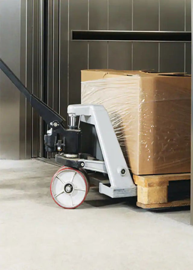 Cargo being moved with a pallet jack