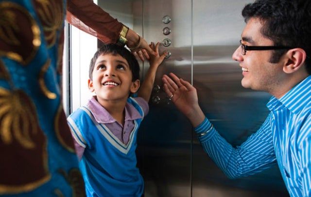 family in elevator