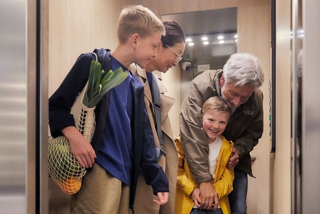 family in elevator