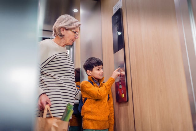 Child and grandmother in an elevator