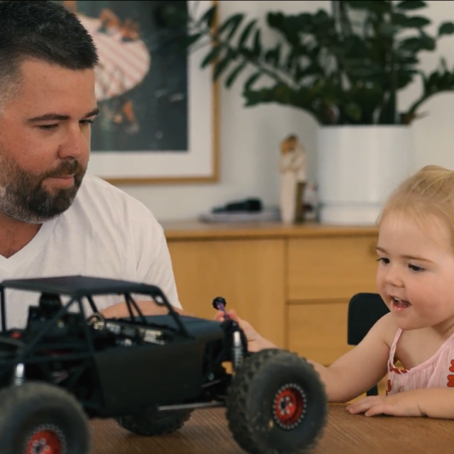  Sam_White_playing_with_his_daughter