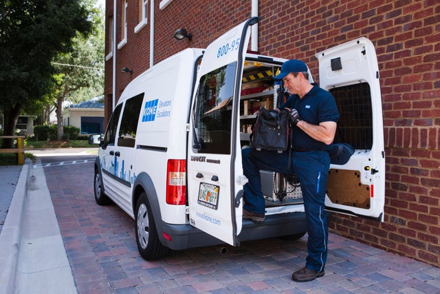 KONE technician and car