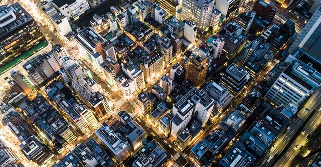 Birdseye view of a city at night.