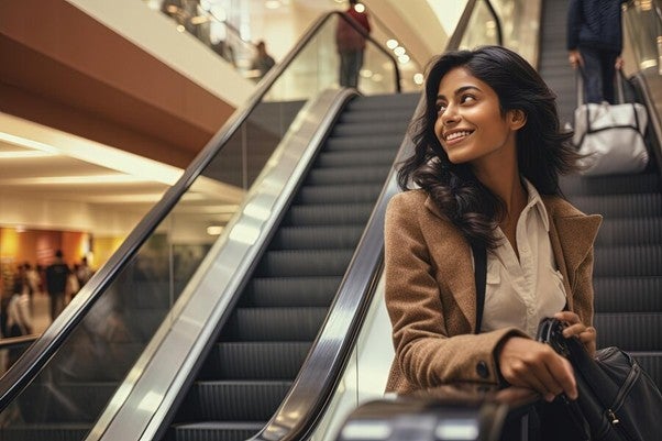 woman on an escalator