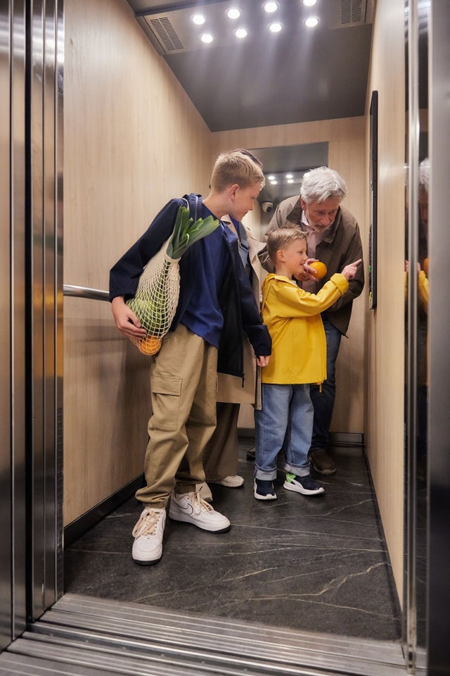 Family inside elevator