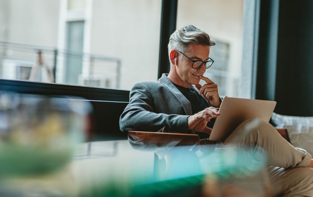 Man looking at a laptop