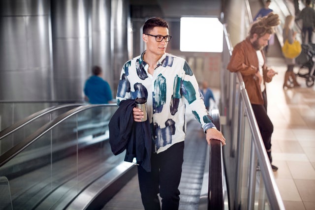 Man travelling on an autowalk