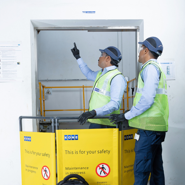 KONE technician on an elevator replacement