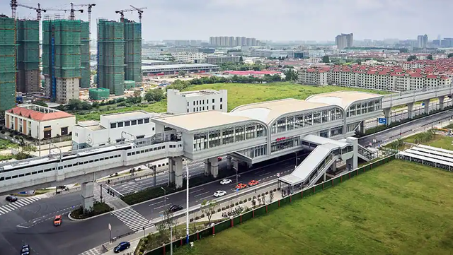An aerial view of an overground metro station.