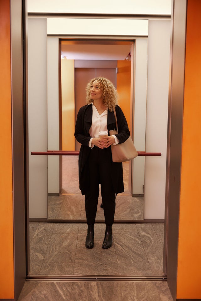 woman inside elevator