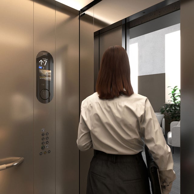 Woman in an elevator