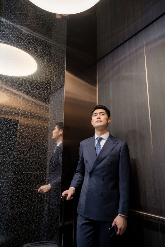Man inside elevator