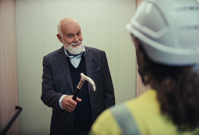 man and women technician talking