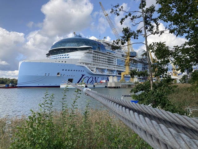 A large cruise ship under construction.