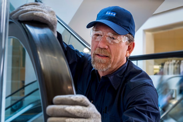 KONE escalator technician at work