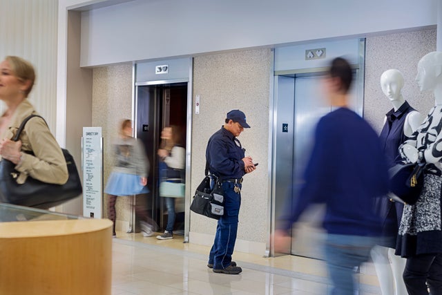 KONE technician in a building lobby
