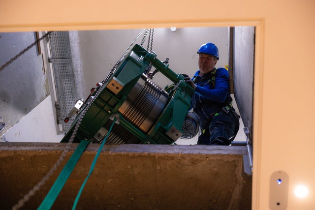 Technician lowering equipment