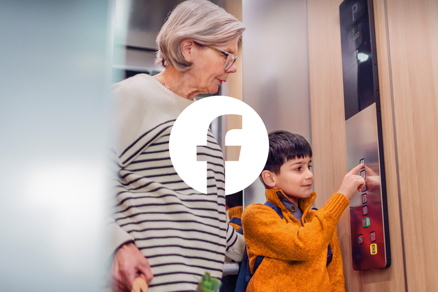 An older woman with a child in an elevator