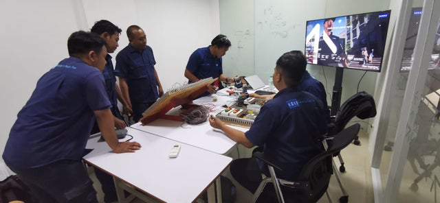Technicians in a class room