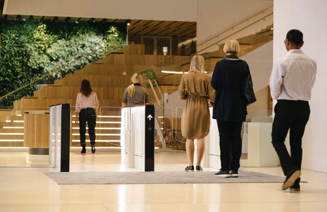 People walking inside K-Kampus