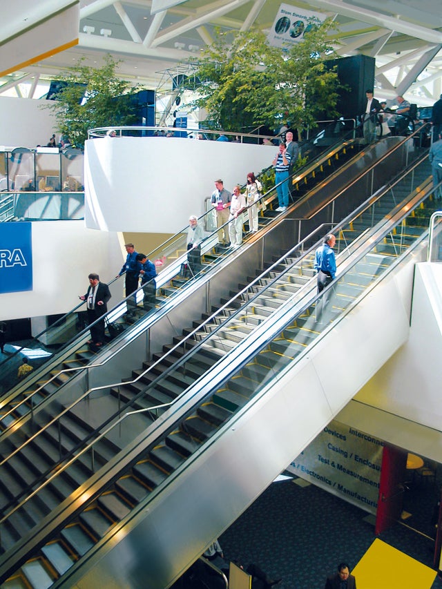 Large escalator with people