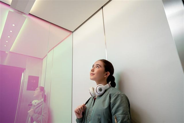 Girl inside elevator