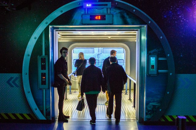 People walking inside an elevator