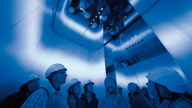 People inside an elevator shaft in Tytyri mine.