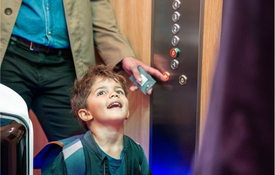 Mother and child in an elevator
