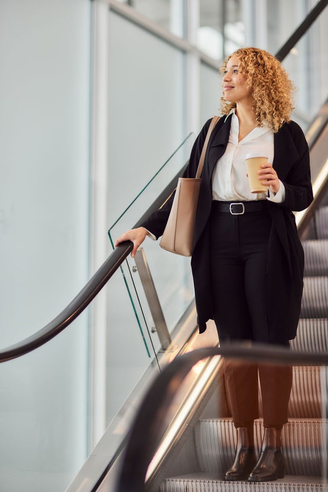 Woman on an escalator