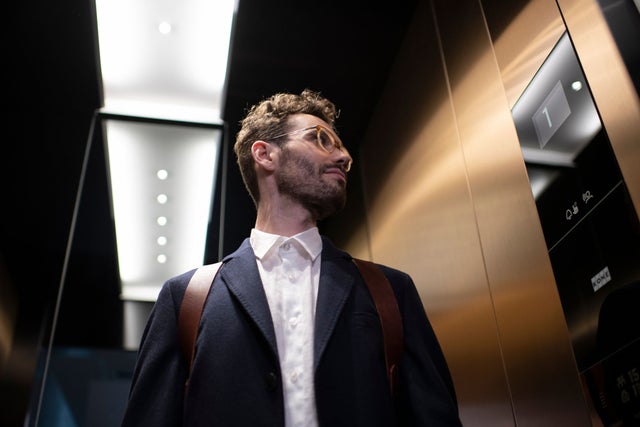 Man in an elevator