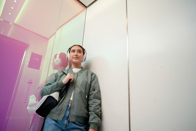 young girl inside elevator