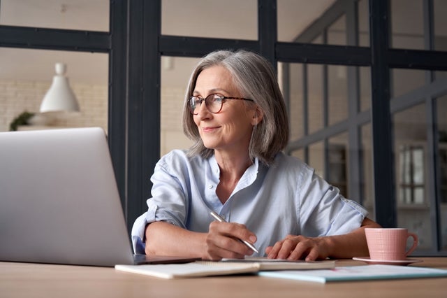 Woman looking at a laptop