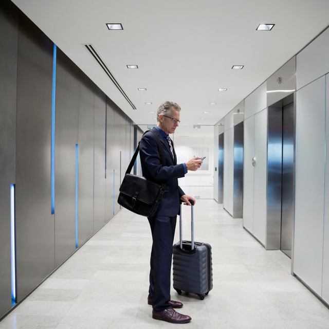 man waiting for an elevator