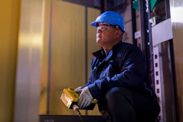 KONE technician with equipment