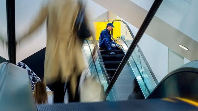 Safe escalator people flow technician