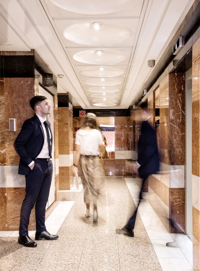 People walking in Edificio Bronce