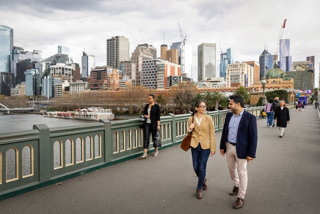 People walking on a bridge
