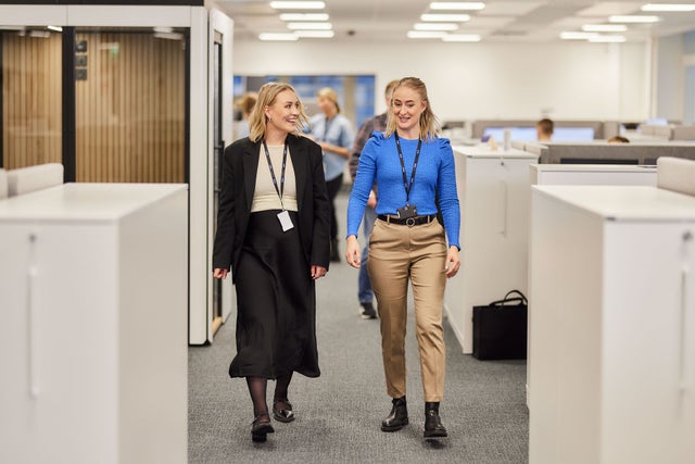 people walking in office