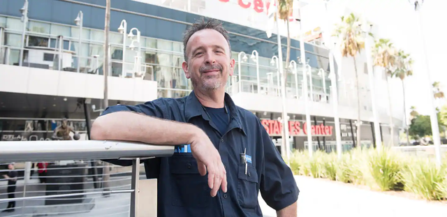  KONE’s Dennis Vitt, primary service mechanic for the Staples Center standing in front of the venue.