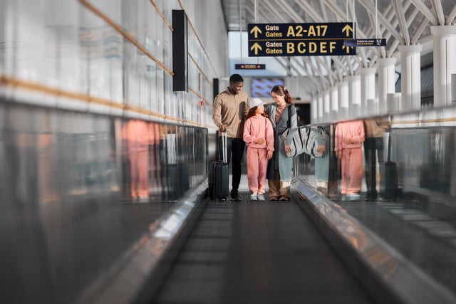 Family on a moving walkway