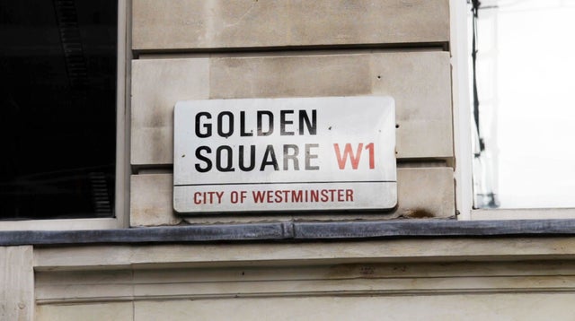 Golden square road sign