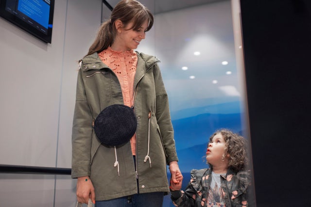 Mother and child in an elevator