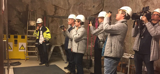 A group of YouTubers with cameras visiting KONE test laboratory in Tytyri, Lohja Finland.