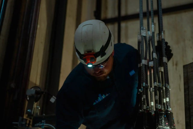 KONE technician John Walsh servicing an elevator.